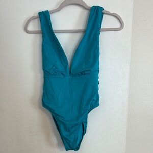 Women’s Trina Turk turquoise one piece bathing suit.  Size 8